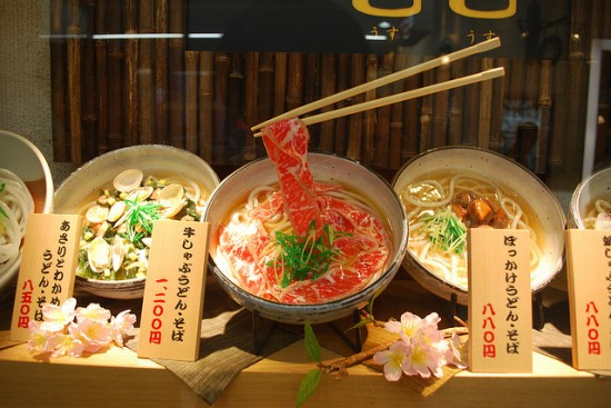 Realistic-looking plastic food on display in a restaurant window